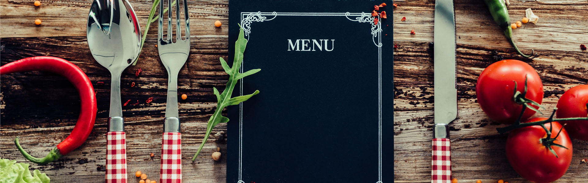 Chalkboard Menu Laying on the Wooden Desk 